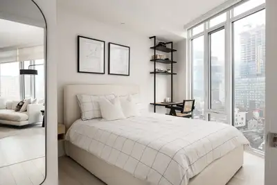 Bright and spacious, fully furnished 2-bedroom, 2-bathroom corner suite featuring an open-concept la...
