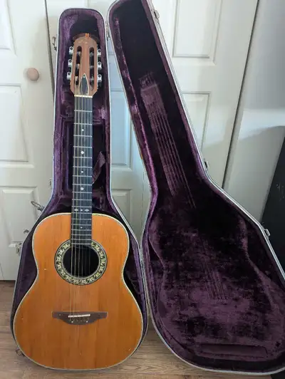 Model 1114-4. Guitar need bridge repair. Known issue with Ovations. Bridge tilts forwards and deform...