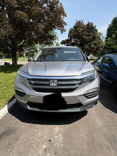 Its a fully loaded pilot with lots of space inside The car has no mechanical problems Selling it saf...