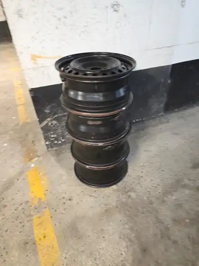 Selling a set of four steel tire rims, each 16 inches in diameter. These rims have been previously u...