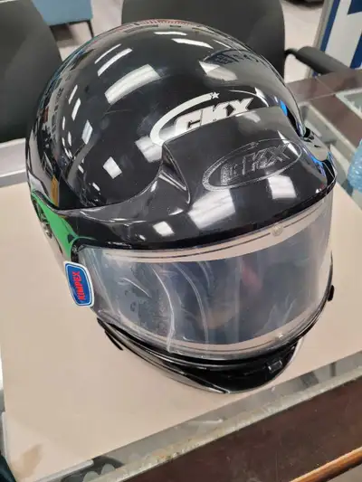 This CKX helmet is a size Large and is Snell M2000 and DOT certified, offering reliable protection....