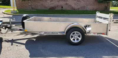 2014 Stronghaul 5' x 10" ALUMINUM Utility Trailer MADE IN CANADA! GVWR is 2990 Pounds since like mos...