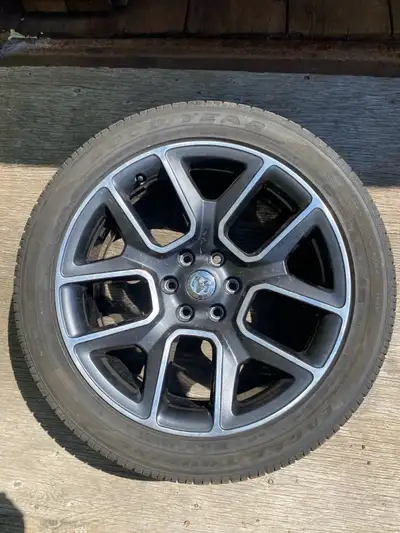 2 like new 2019 Ram Sport rims. Tires are half worn.