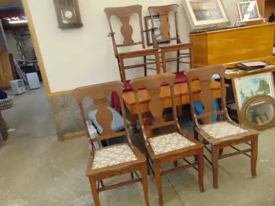 Here are 5 oak chairs 4 where being used in the home and are in decent condition the 5 th has apaint...