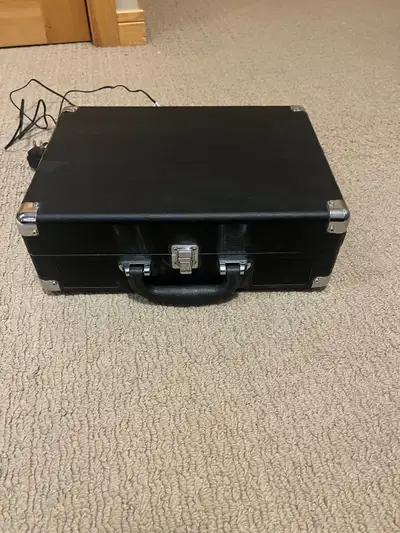 Selling my Victrola record player, which is in good condition and plays records smoothly. This porta...