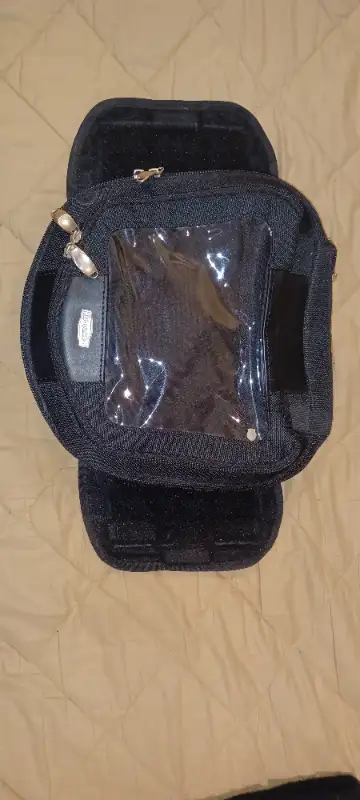 Kuryakyn expandable motorcycle tank bag . bought and never used. If interested send your telephone n...