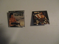 2 SYLVESTER STALLONE PINS-ROCKY 1V & RAMBO-1980'S-VINTAGE-CLEAN!