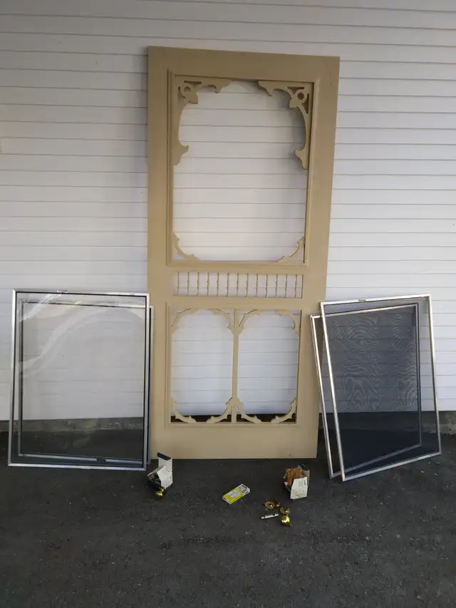 One large Country hardwood patio screen and storm door