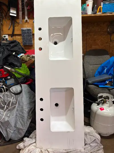 New,Never installed 60x19x1 double sink with quartz counter top . And 36x19x1 single sink with quart...