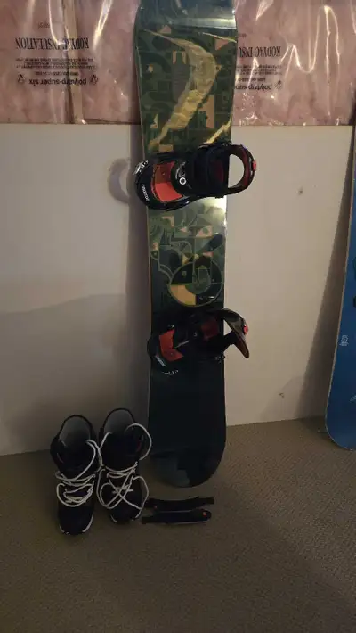 Vintage Burton snow board with boots and bindings never used., View more