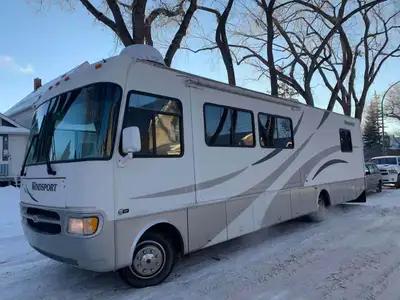 35 feet long, solid fiberglass type construction, Ford chassis, backup camera, added solar panels, t...