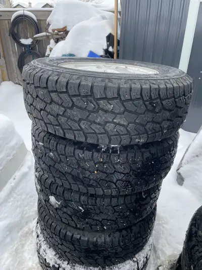 We are selling a full set of 4 Ford 16 inch rims with Sailun Terramax AT winter tires, size 235/70 R...