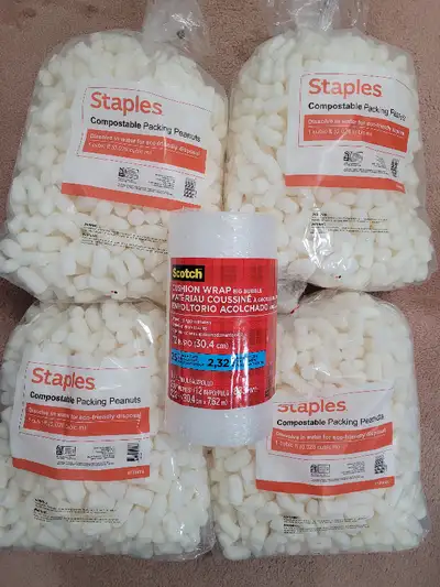 4 Staples Packing Peanut Bags and 1 Scotch Cushion Wrap Big Bubble. 1 Bag of the Staples Packing Pea...