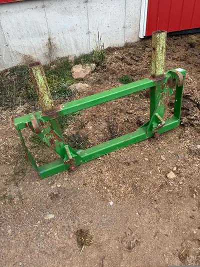 Double spear ( one spear is broke off) Has 6 foot extensions for moving square bales. They are quick...