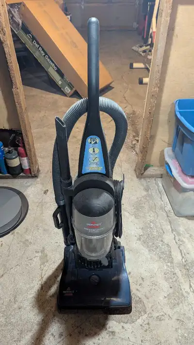 I'm selling a Bissell upright vacuum that's perfect for keeping your floors clean and tidy. It featu...