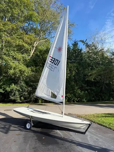 1984 Laser Sailboat, white hull. The boat is in good condition, is watertight no leaks. Full/standar...