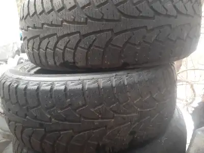 Set OF 2 . DIRECTIONAL WINTER TIRES. VERY GOOD CONDITION LEAVE CONTACT NUMBER