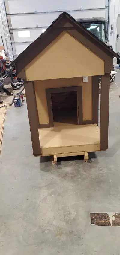 New/unused dog house for large breed dog. 3' x 3' house plus 2' x 3' covered veranda. R12 insulation...