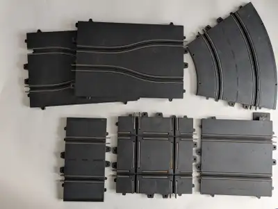Total of 83 pieces of track made up of: Qty Description 51 X 45 degree curve track 2 X chicanes 2 X...