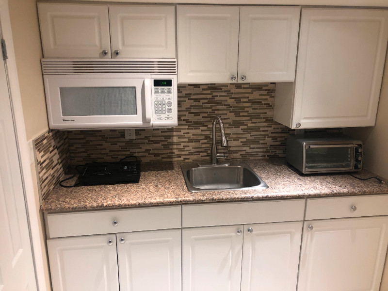 JULY 1ST Modern Basement Bachelor near Victoria Park station Long