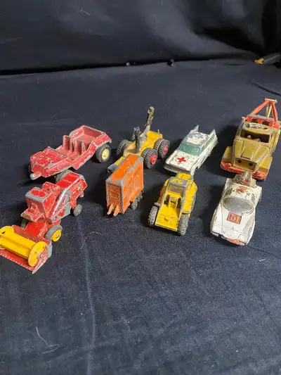 I am selling this Small Lot of Old Metal Toy Cars and Trucks for $22.