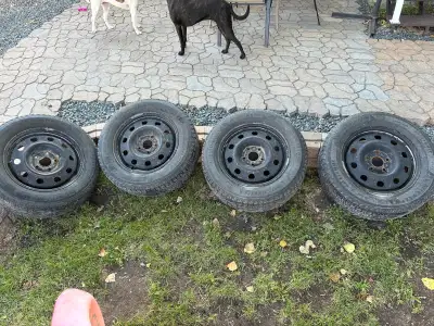 Full set of 225/65R17 Winter tires and rims for sale Previously used 1 year on a 2013 Dodge journey...