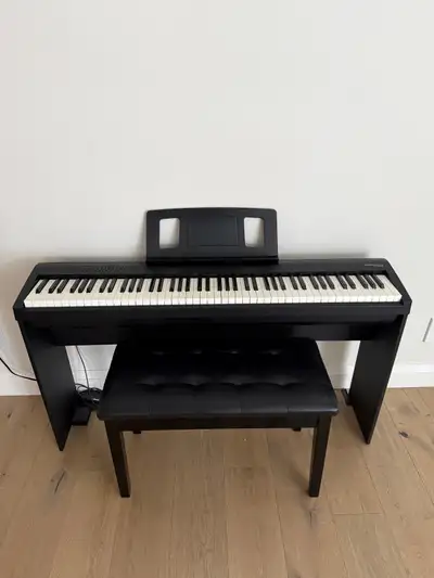 Roland FP-30X Piano with stand and seat for sale - New $1600.00, asking $1100.00. Original owner and...