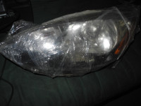 L H Head light Mazda2 , 2013
