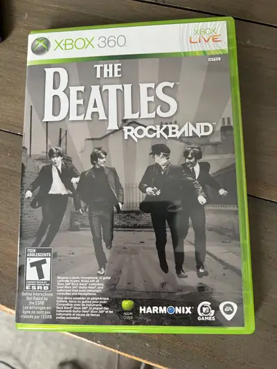 The Beatles Rockband for Xbox 360. Set includes game, drums and guitar. In great condition.