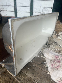 Old cast tub