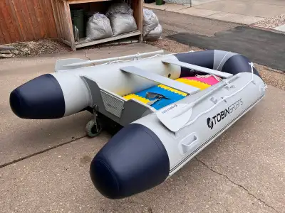 10.8 ft. PVC boat with upgrades and accessories. Drop stitch air floor. Inflatable keel. Comes with...