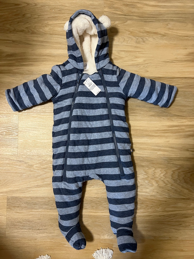 Brand new GAP 6-12 months bunting in Clothing - 9-12 Months in Peterborough