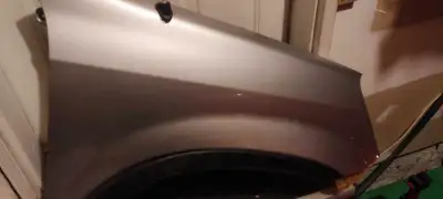 Right / passenger side front fender in silver color. It's dent free with no damage. $80. It's still...