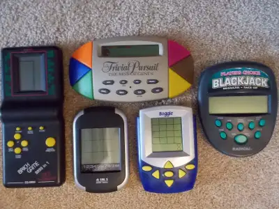 4  Vintage Handheld Electronic games, View more