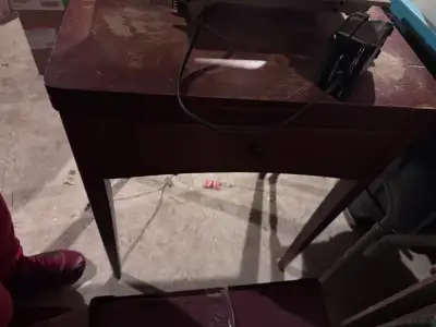 Vintage sewing machine and desk, View more