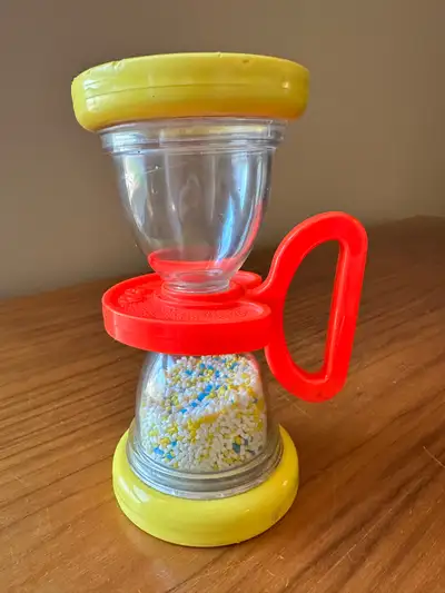 Vintage 1973 Fisher-Price Shake 'n Roll rattle hourglass toy, View more