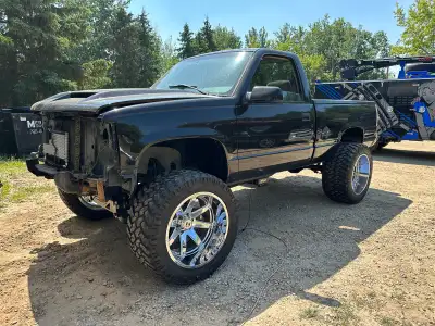 Hostile alpha 22x14 with nitto 375/45r22 tires. Bolt pattern is half ton Chevy 6x5.5, 6x139. Bead ba...