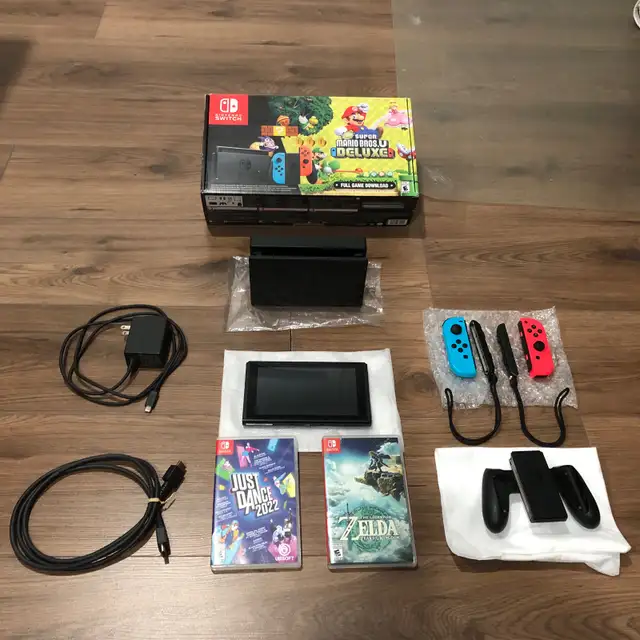 Nintendo switch + games in Nintendo Switch in Laval / North Shore - Image 5