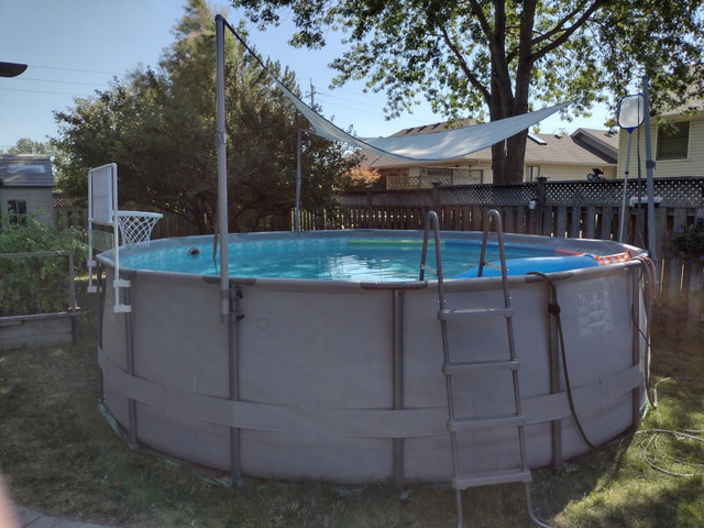 16-foot above ground pool with all accessories, value $1,250  in Hot Tubs & Pools in Leamington