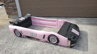 Pink kids car bed
