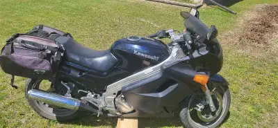 This Kawasaki Ninja 2003 is a reliable sport bike perfect for city commuting or weekend rides. It ha...