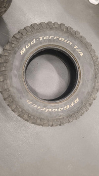 33x12.5x16.5LT Mud tires.