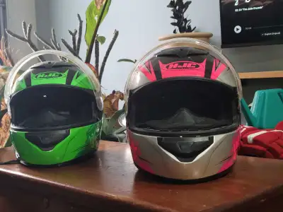 I'm selling a used HJC helmets, pink is XL and green is M. Make an offer!
