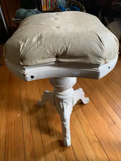 An Antique Piano stool. Age is uncertain; but thought to be pre-1920's. In good condition for age. A...