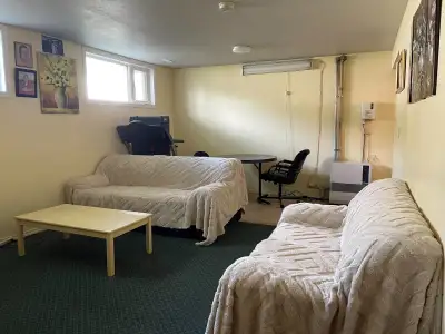 One furnished bedroom in a shared basement suite available December 1, 2025. Shared spaces include t...