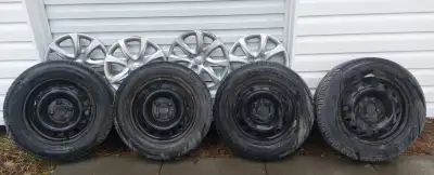 4 all season tires on rims: 2 are Uniroyal, Tiger Paw 2 are Motomaster, AWII both have good tread le...