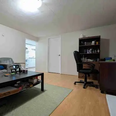 Kitchen, 1 Bathroom w/ Shower, Living Room, Laundry and Dryer in Suite. About $900 + Utilities (Nego...