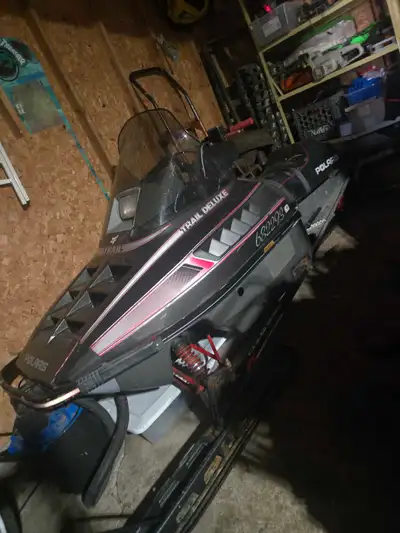 Polaris indy 488 with electric start and reverse comes with a spare studed track. Will consider othe...