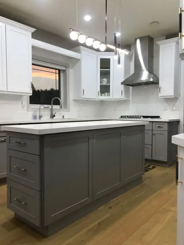 All wood kitchen and bath cabinets and countertop