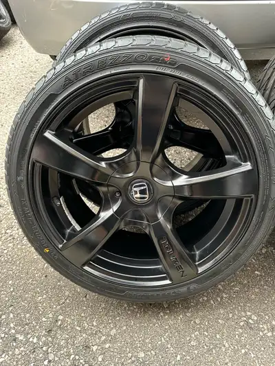 Selling a new set of 18 inch black TOUREN “TR9” rims with a staggered set of brand new 235/40/18 SAI...